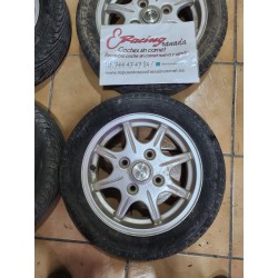 Llanta Tasso usada con neumático inservible 145/60 R13